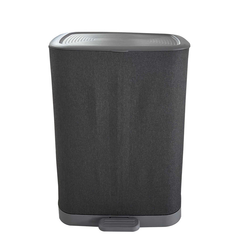 A covered dirty clothes basket