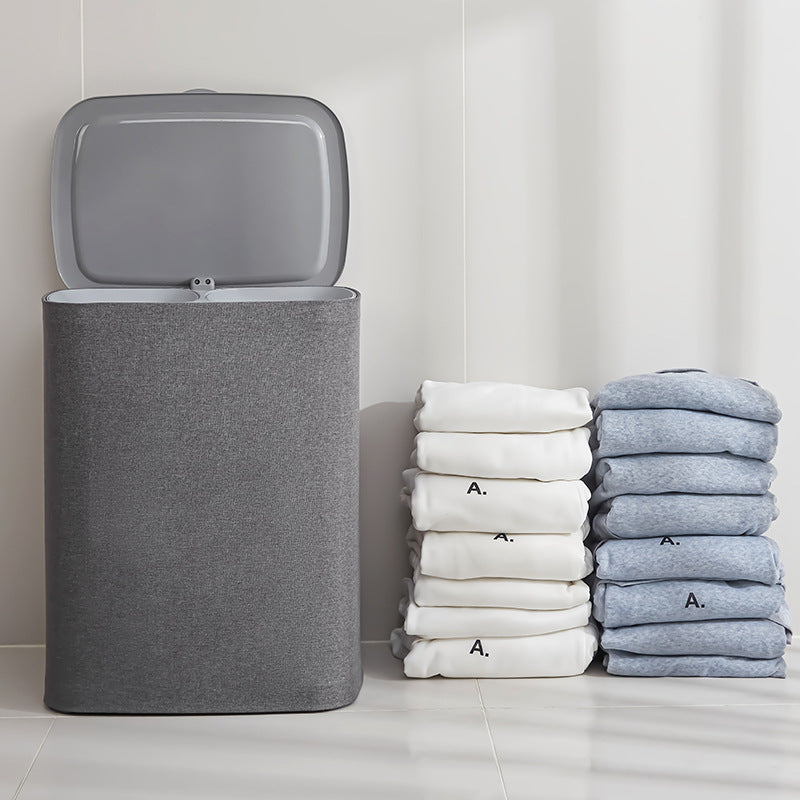 A covered dirty clothes basket