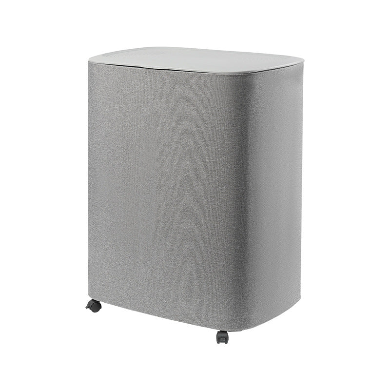 A covered dirty clothes basket